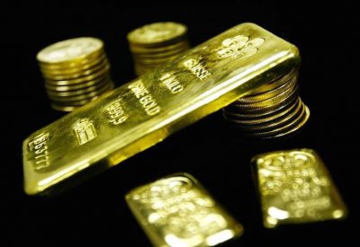 الذهب يتراجع مع عودة الدولار للصعود
