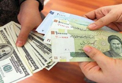 الدولار يسجل رقما قياسيا في مواجهة الريال الإيراني