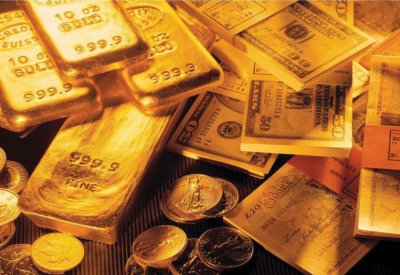 الذهب يهبط بضغط من ارتفاع الدولار ومخاوف رفع الفائدة