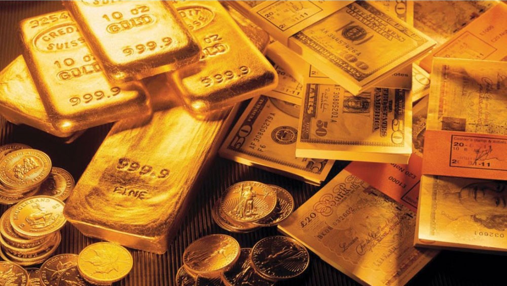 الذهب يهبط بضغط من ارتفاع الدولار ومخاوف رفع الفائدة