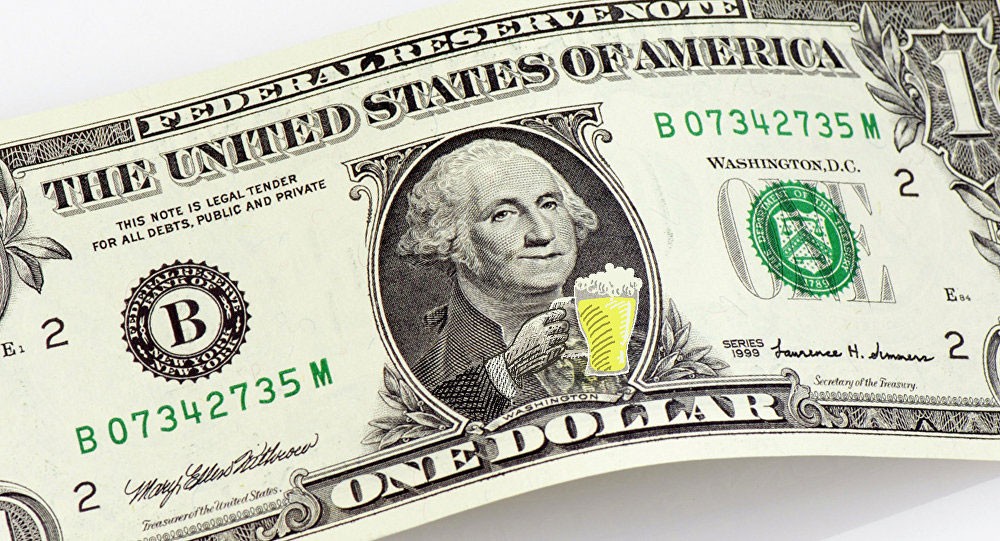 ارتفاع الدولار وتراجع أسعار الذهب
