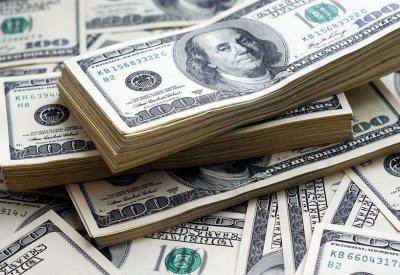 الدولار يتماسك بدعم من ارتفاع عوائد السندات الأمريكية