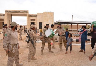 جنود سعوديون يرسمون البسمة على وجوه أطفال اليمن