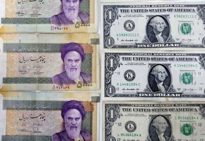 طهران تتحدى واشنطن.. بإجراء ضد الدولار