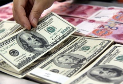 الدولار يرتفع مقابل اليوان الصيني وسط تهديدات بفرض رسوم أمريكية اقتصادي