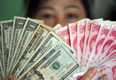 اليوان يبلغ أقل سعر في 14 شهراً مع تكثيف ترامب الضغط على بكين