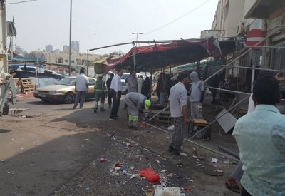 "الأمانة" ستنقل البحرينيين المخالفين لداخل السوق