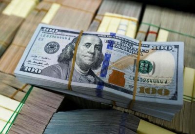 الدولار ينخفض مع تأكيد باول على سياسة رفع أسعار الفائدة