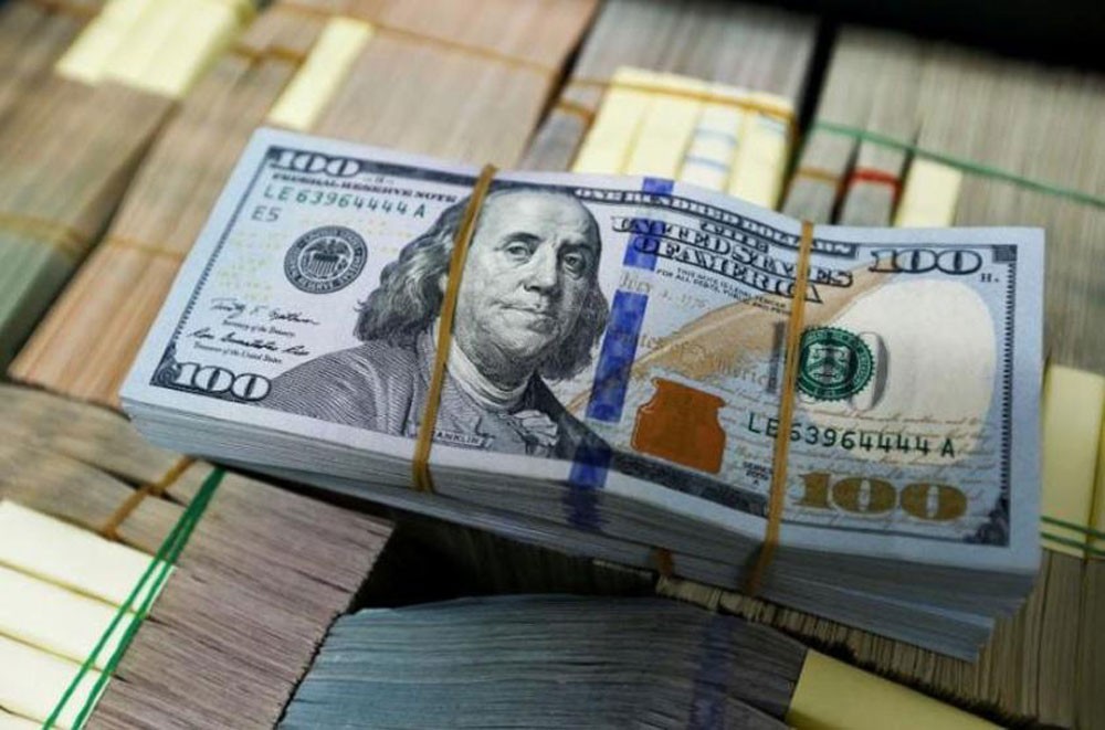الدولار ينخفض مع تأكيد باول على سياسة رفع أسعار الفائدة
