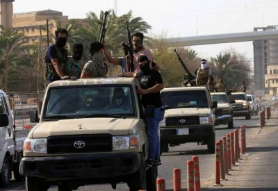 "الحشد" في شوارع البصرة بعد ليلة ساخنة.. وحصيلة الضحايا ترتفع