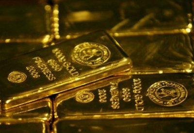 الذهب يتراجع .. والدولار يرتفع