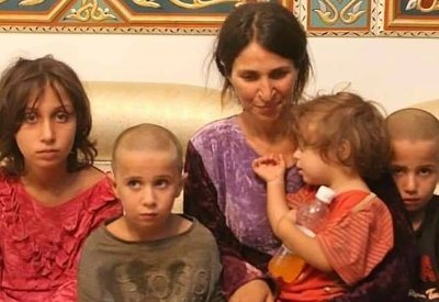 إعلام النظام السوري: تحرير 19 امرأة وطفلا من داعش