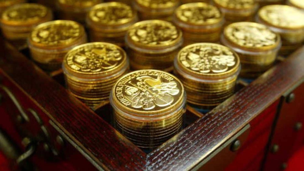 الذهب يهبط مع صعود الدولار والأسهم الأوروبية