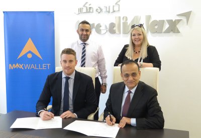توقيع إتفاقية MaxWallet بين كريدي مكس و Travelex Bahrain  