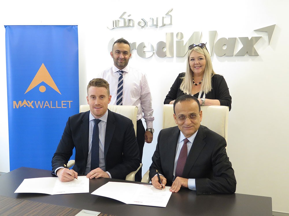 توقيع إتفاقية MaxWallet بين كريدي مكس و Travelex Bahrain  