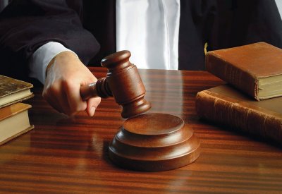 تأييد الحبس سنة والإبعاد للمنقبة العربية المتحرشة بعامل المغسلة