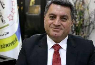 بعد تهديدات النظام وأنقرة.. عين الأكراد على باريس