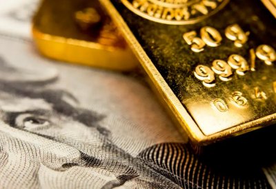 أونصة الذهب تصعد لـ 1279 دولاراً مع تراجع الدولار