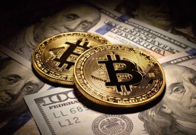 "بيتكوين" تقفز لأعلى مستوى بـ 13 شهراً فوق 9300 دولار