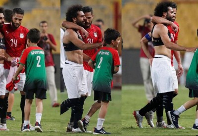  بالصورة.. قصة الطفل المصري وقميص صلاح في "برج العرب"