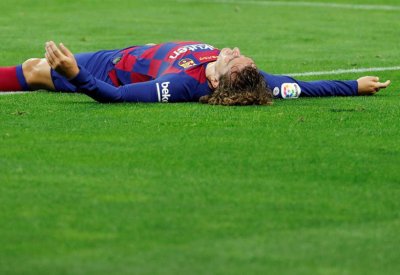 أتلتيكو يطلب منع تسجيل غريزمان مع برشلونة
