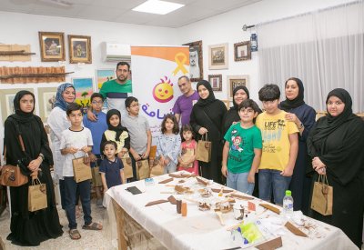 الأطفال ابطال مبادرة "ابتسامة" يزورون مركز تنمية الصناعات الحرفية