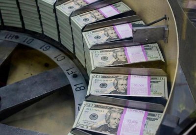 الدولار يتراجع بفعل "البيانات الصينية"