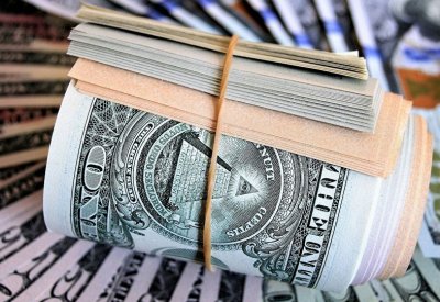 مسؤول بريطاني: الاقتصاد العالمي يحتاج إلى بديل للدولار الأمريكي