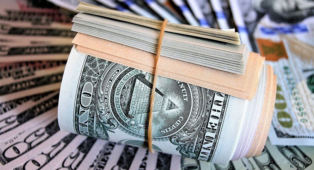 مسؤول بريطاني: الاقتصاد العالمي يحتاج إلى بديل للدولار الأمريكي