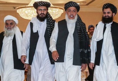 طالبان تفجّر في أفغانستان.. وتفاوض في إيران