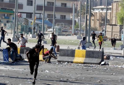 العراق.. لجنة عليا للتحقيق في الاعتداءات على المتظاهرين