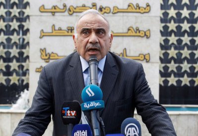 رئيس وزراء العراق: نتعهد بحماية التظاهرات