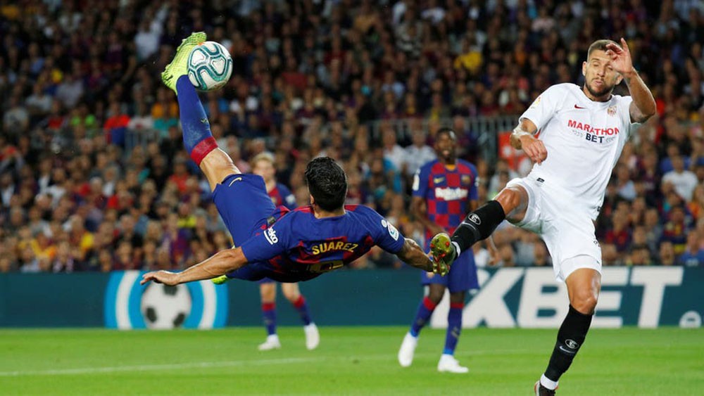 برشلونة يتلاعب بإشبيلية ويخطف المركز الثاني