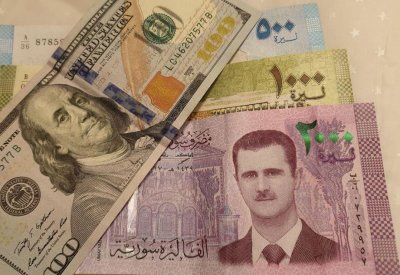  الليرة السورية تسجل مستوى قياسياً منخفضاً 