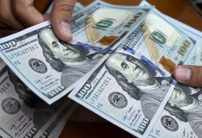 الدولار مستقر أمام معظم العملات الرئيسية في تعاملات راكدة قبيل عطلة عيد الميلاد