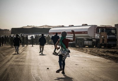 بالصور: قتلى بالرصاص في واحد من "أعنف" أيام المواجهات بالعراق 