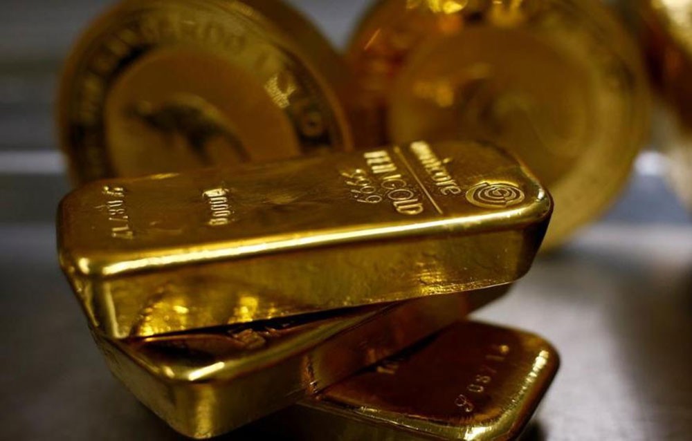 الذهب يبلغ ذروة أسبوعين لإقبال على الملاذات بسبب مخاوف الفيروس