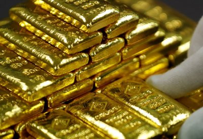 صعود الذهب وتراجع الدولار وترقب لقرار المركزي الأمريكي