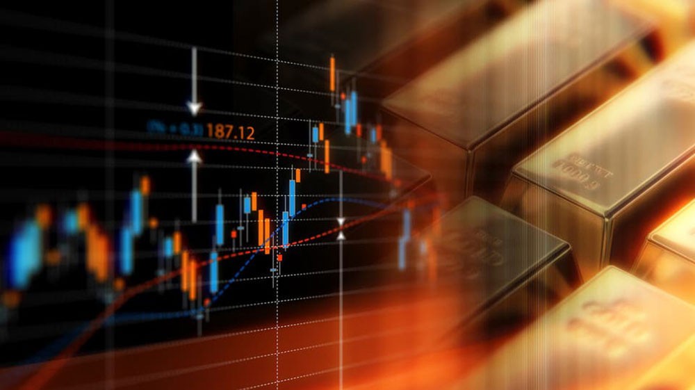 الذهب يتراجع بفعل قوة الدولار ومبيعات لجني أرباح