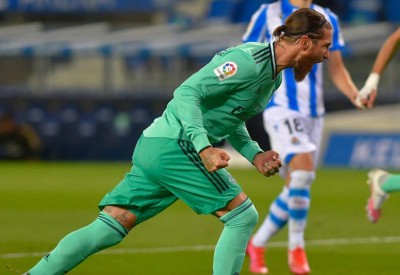 ريال مدريد ينتزع الصدارة بثنائية راموس وبنزيمة