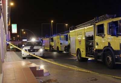 بالصور.. حريق بمبنى تجاري في الديه.. ووفاة احدى العاملات واصابة اخرين 