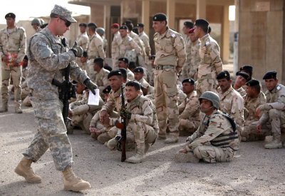 التحالف ينسحب من قاعدة التاجي ويسلمها للجيش