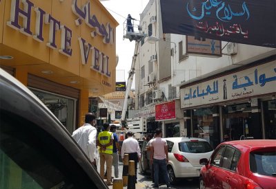 مشاداة في سوق المنامة بين مواطنين  وعمال صيانة كاميرات المراقبة