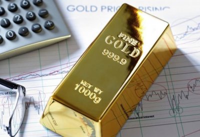 الذهب يتراجع وسط ضغوط من ارتفاع الدولار