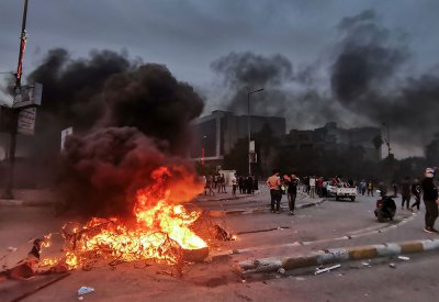العراق.. قتيل ومصابون في مواجهات بالناصرية