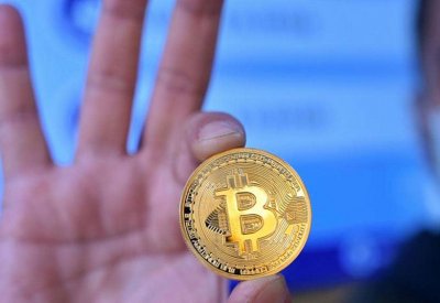 "البيتكوين" تسجل رقما قياسيا جديدا