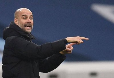 غوارديولا يطالب لاعبي سيتي بركض أقل وانتصارات أكثر