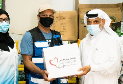 بدء توزيع السلال الرمضانية بالتعاون بين فريق "نبضة حياة" و"مدينة حمد الخيرية"