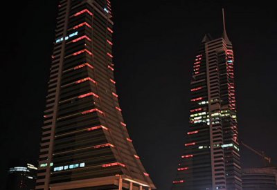 وزارة الصحة بمملكة البحرين تشارك في الحملة العالمية بإضاءة مرفأ البحرين المالي ومجمع مودا مول البحرين باللون البرتقالي