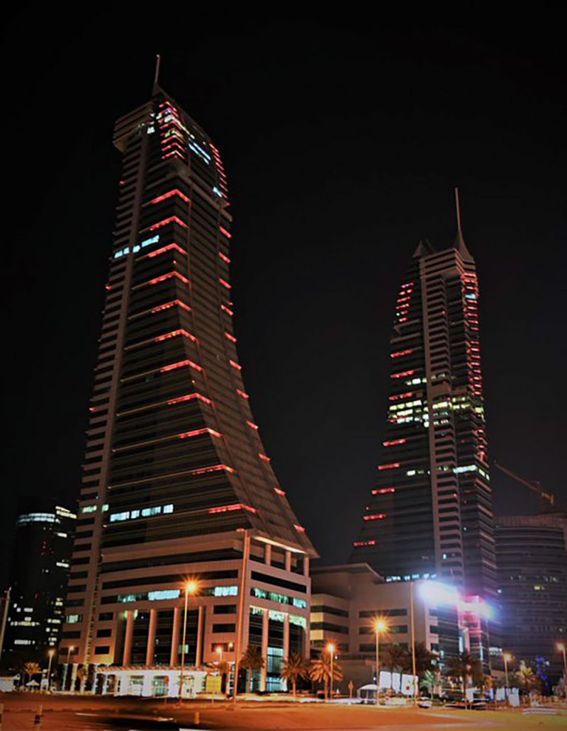 وزارة الصحة بمملكة البحرين تشارك في الحملة العالمية بإضاءة مرفأ البحرين المالي ومجمع مودا مول البحرين باللون البرتقالي